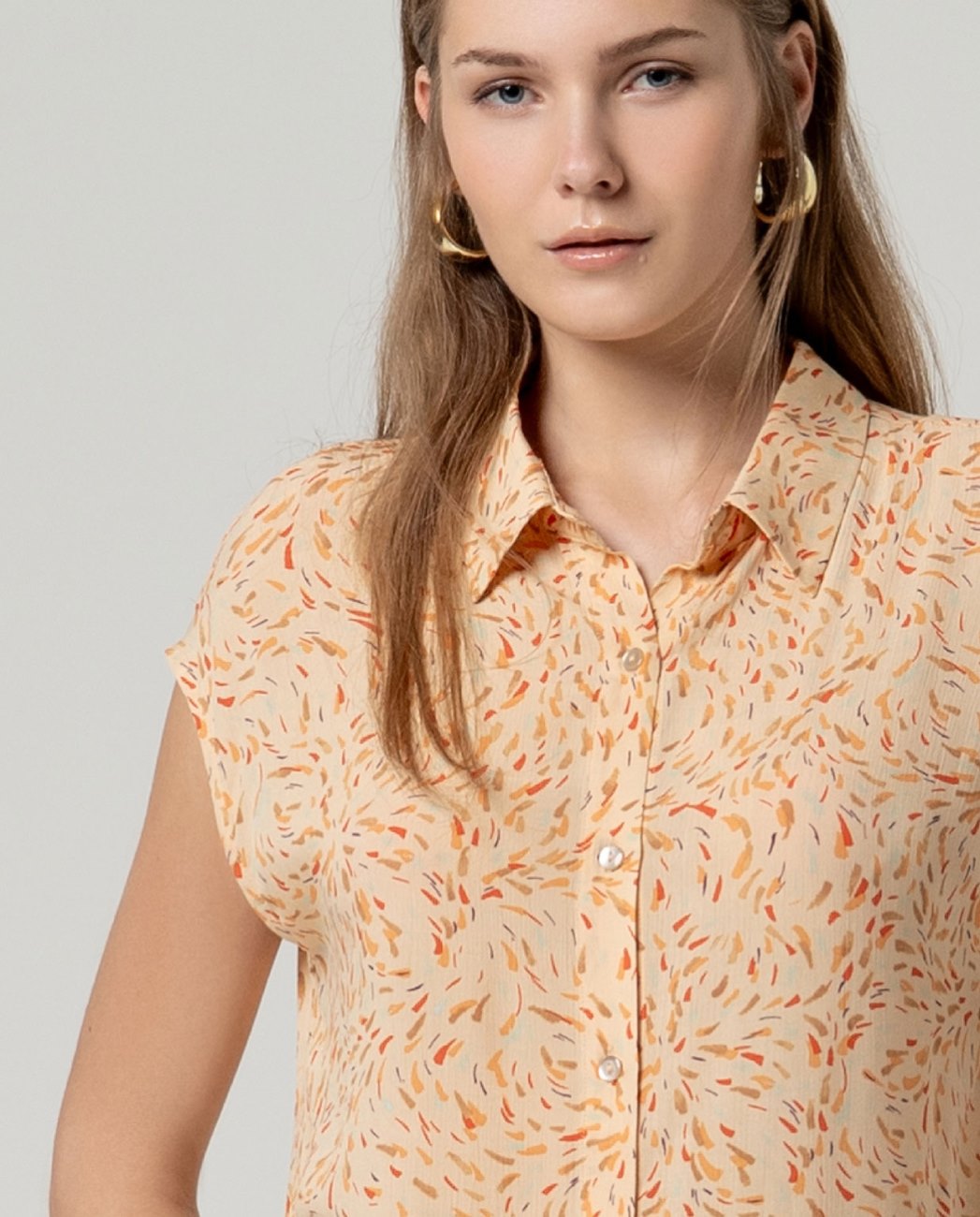 Camisa sin mangas